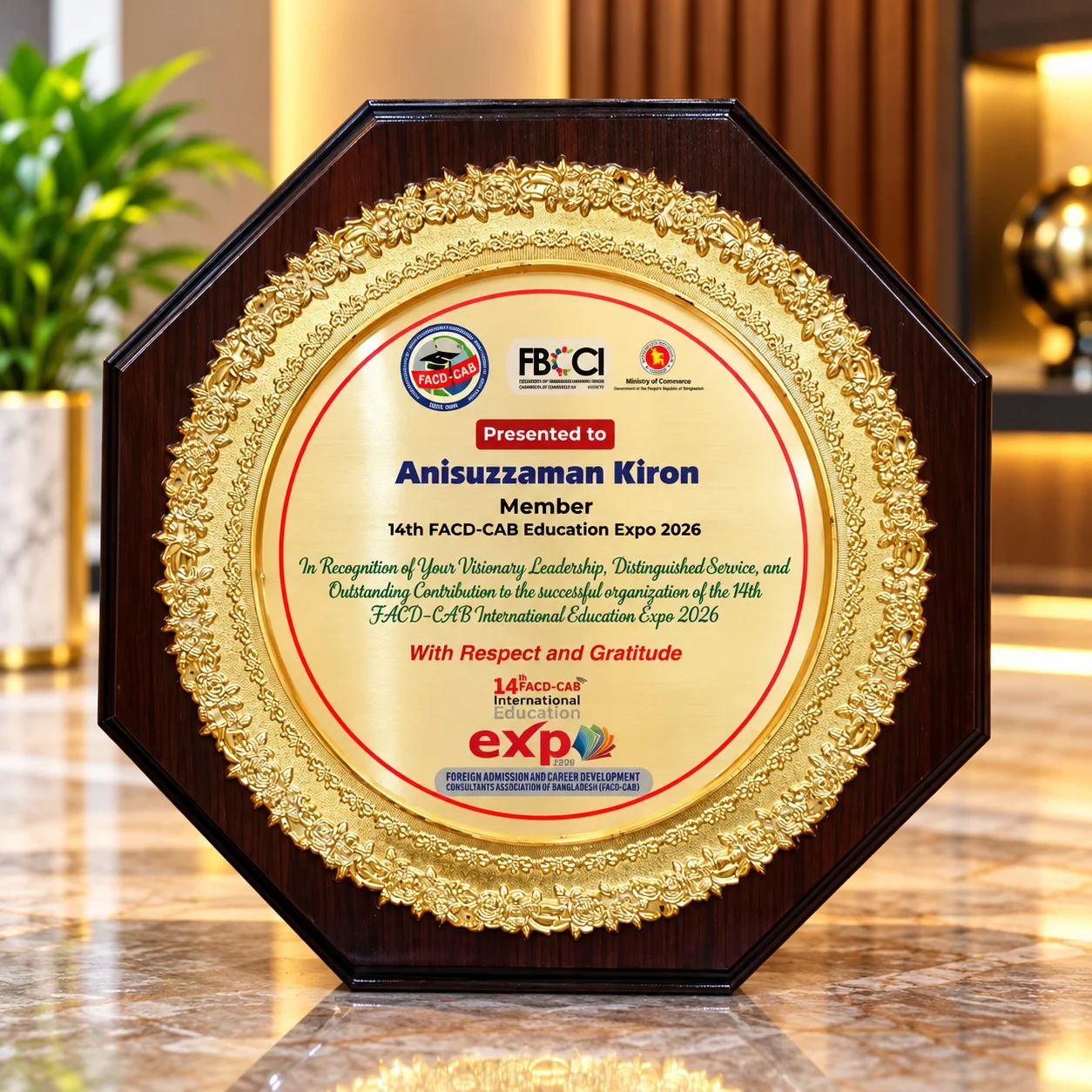 Anisuzzaman Kiron receiving recognition for organising the 14th FACD-CAB International Education Expo 2026