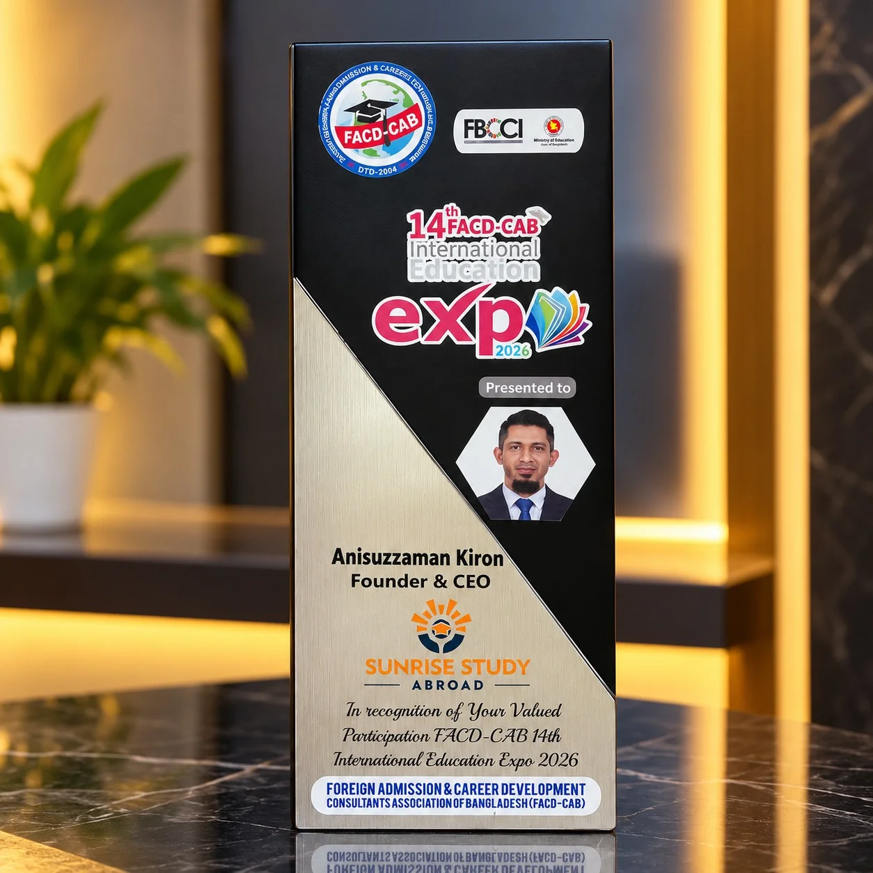Anisuzzaman Kiron receiving recognition for participation in the 14th FACD-CAB International Education Expo 2026